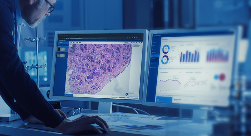 Pathology team reviewing digital slide images